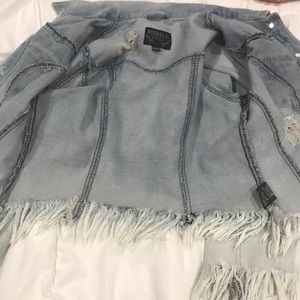 Ripped jean jacket, used once not ripped look like